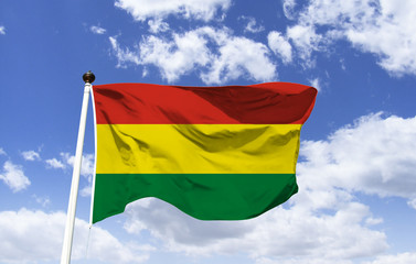 Model of the Bolivia flag, fluttering under a blue sky. South American country, includes Andes and Atacama Desert. The administrative capital is La Paz, on the border with Peru is Lake Continent.