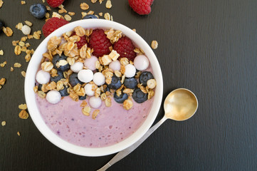 Homemade healthy yogurt with muesli and blueberries.