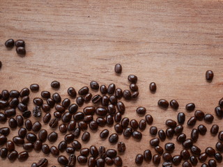 coffee beans on wooden background