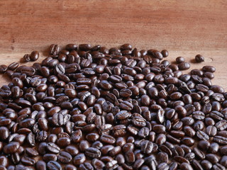 organic aroma coffee beans on wood background