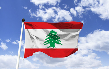 Mockup of the flag of Lebanon, fluttering under a blue sky. Country in Western Asia, located at the eastern end of the Mediterranean Sea, bordering Syria, Israel and Cyprus. Capital: Beirut