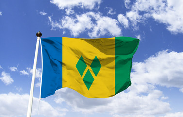 Saint Vincent and the Grenadines flag mockup floating under a blue sky, Caribbean. Main Island: St. Vincent, home of the Kingstown Capital. Points of Interest: Union Island, Canouan, Mount Royal