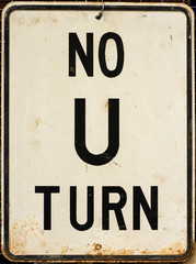 Rusted No U Turn Sign