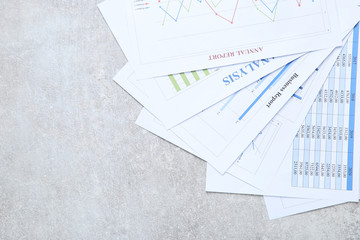 Financial papers with graph and charts