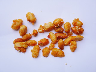 caramel peanut beans white background, sweet candy nut