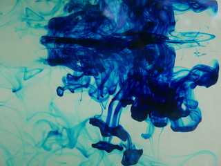 splashes of water in motion, blue ink, color water