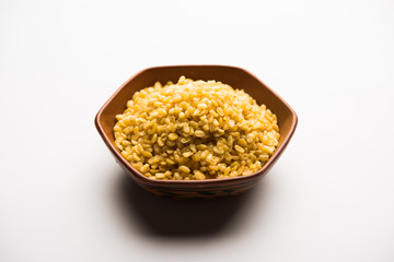 Salty and Fried Moong Dal Namkeen served in a bowl, selective focus