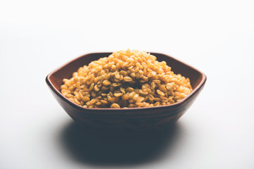 Salty and Fried Moong Dal Namkeen served in a bowl, selective focus