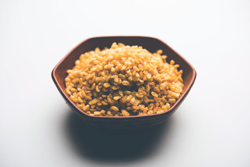 Salty and Fried Moong Dal Namkeen served in a bowl, selective focus