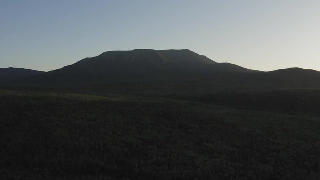 A wide drone shot of misty sunrise of Katahdin in baxter state park at sunrise
