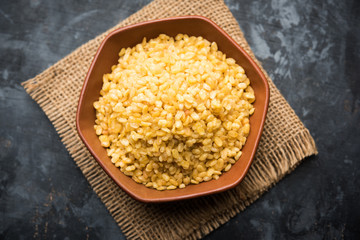 Salty and Fried Moong Dal Namkeen served in a bowl, selective focus