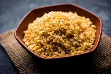 Salty and Fried Moong Dal Namkeen served in a bowl, selective focus
