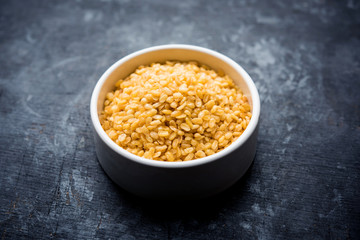 Salty and Fried Moong Dal Namkeen served in a bowl, selective focus
