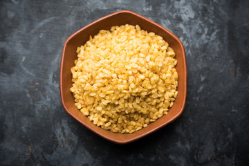 Salty and Fried Moong Dal Namkeen served in a bowl, selective focus