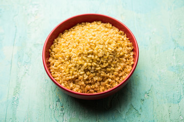 Salty and Fried Moong Dal Namkeen served in a bowl, selective focus