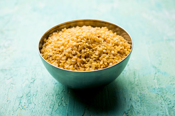 Salty and Fried Moong Dal Namkeen served in a bowl, selective focus