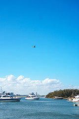 Beautiful view of the Broadwater and fishing boats moored at a nearby dock on a cloudy day before the storm. Gold Coast, Australia.