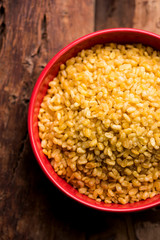 Salty and Fried Moong Dal Namkeen served in a bowl, selective focus