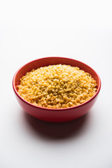 Salty and Fried Moong Dal Namkeen served in a bowl, selective focus