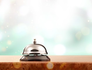 Vintage hotel reception service desk bell.