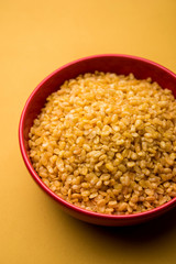 Salty and Fried Moong Dal Namkeen served in a bowl, selective focus