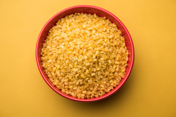 Salty and Fried Moong Dal Namkeen served in a bowl, selective focus