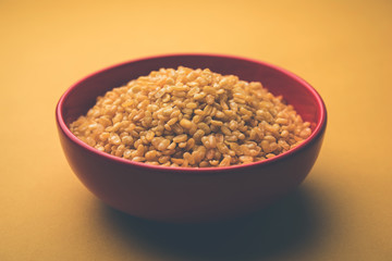 Salty and Fried Moong Dal Namkeen served in a bowl, selective focus