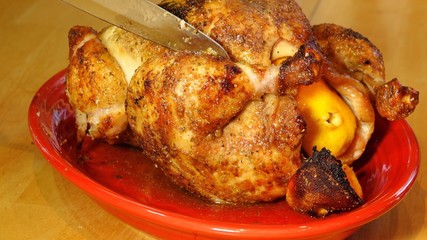 Carving up roasted chicken