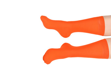 Orange socks on woman foot isolated on white background.