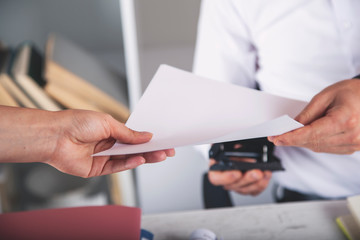 two worker hand document