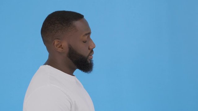 very sad upset man on an isolated background 4K