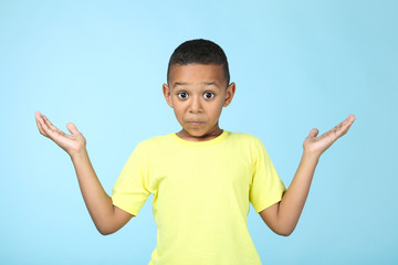 Cute american boy on blue background