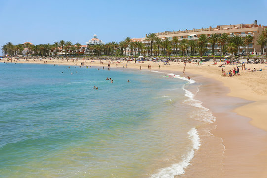 TENERIFE, SPAIN - MAY 28, 2019: Playa del Camison beach on Adeje Coast, Tenerife.