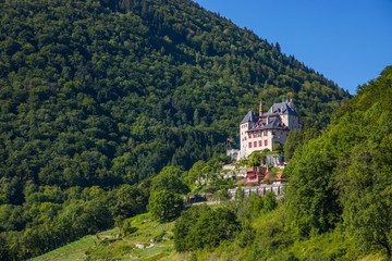 Fototapeta premium The Chateau de Menthon, a medieval castle located in the commune of Menthon Saint-Bernard south of Annecy in the Haute-Savoie departement of France