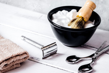 Wooden desktop with tools for shaving beards