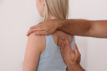Back pain , Osteopathy / Chiropractic treatment. Physiotherapy for female patient. Bad posture...
