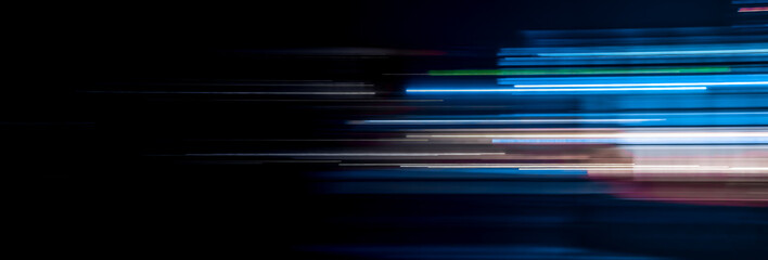 Abstract motion light trails on the dark background