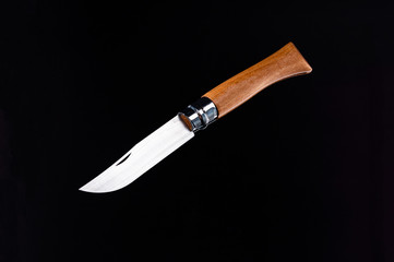 Knife isolate with a wooden handle. French knife.