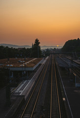 Fototapeta premium Railroad station at sunrise in Backnang, Germany