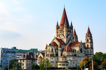 Fototapeta premium The St. Francis of Assisi Church in Vienna, Austria at sunrise. Also known as the Kaiser Jubilee Church and the Mexico Church