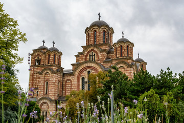 Fototapeta na wymiar St. Mark's Church and cloudy sky in Belgrade, Serbia