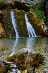Fototapeta na wymiar The Enipeas Waterfall at the Olymp mountains in Greece