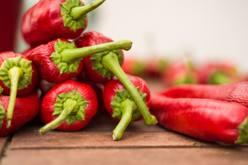 red peppers spilled on a table