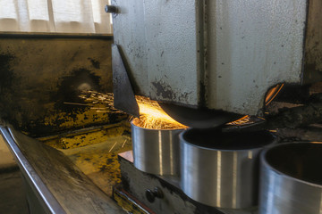 Flat grinding of metal on a machine with sparks, technological grinding of parts alignment.