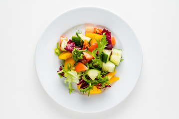 vegetable salad on the white plate