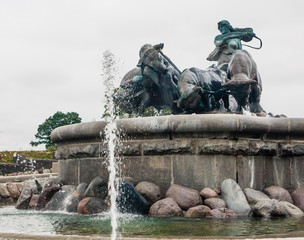 Norse goddess Gefjon statue by Anders Bundgaard on the Gefion Fountain. Churchill Park . Copenhagen. Denmark