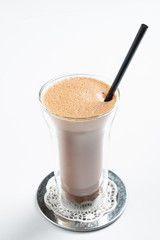 hot chocolate with cinnamon on the white background