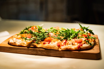 pizza on the wooden board