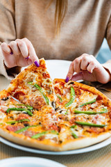 tasty pizza in the pizzeria