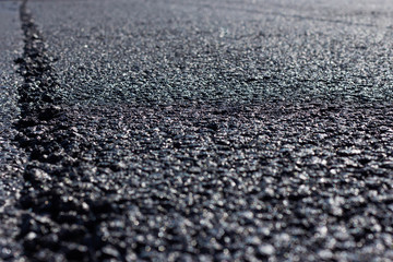 Asphalt road close-up, road works
